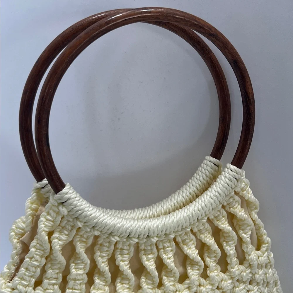 Vintage handmade Macrame cream pale yellow handbag with 7” wood rings